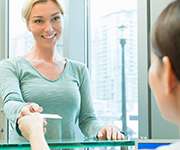 woman smiling giving insurance