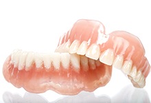 Pair of dentures in Palm Beach resting on a table
