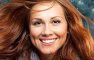 red headed woman smiling