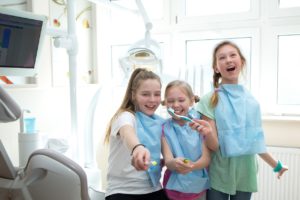 Three children at dentist