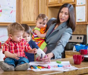 busy mother gathering children in kitchen